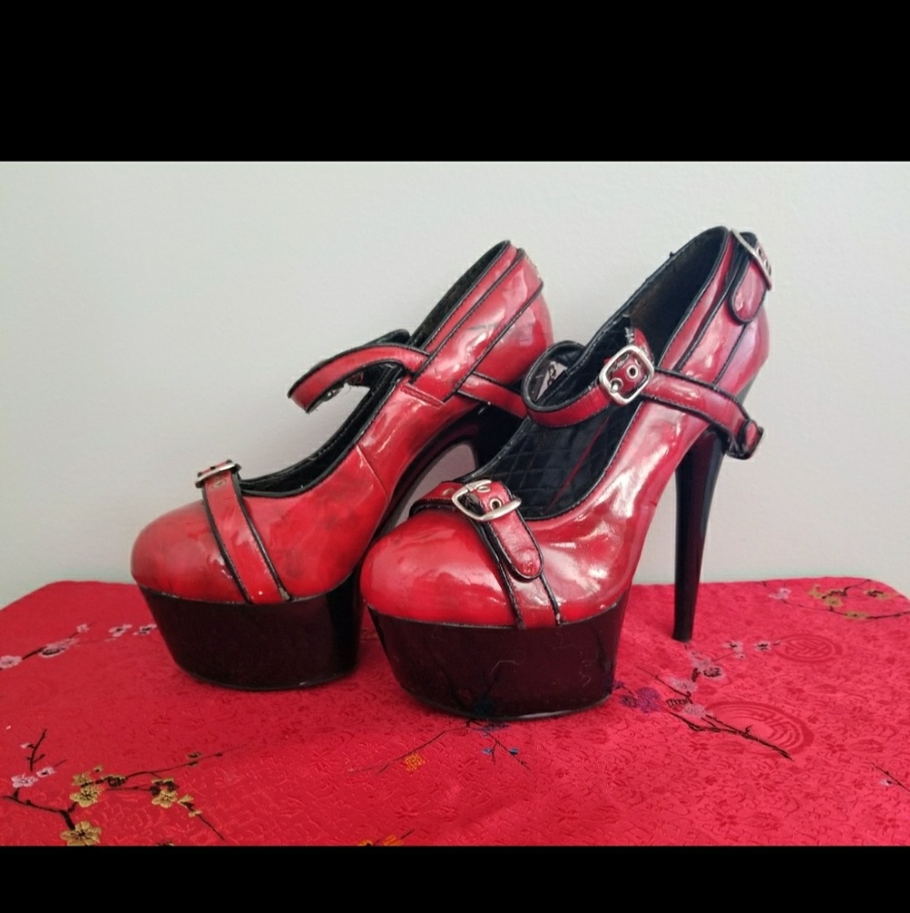 Red Penthouse patent leather heels